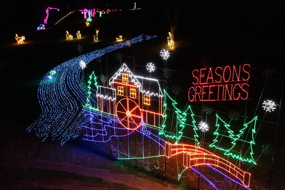 Enjoy the Peaceful Vibes of Bethel Wood’s Holiday Light Display Woman